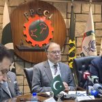 Federal Minister and FPCCI President signing the Udaan Pakistan Program agreement.