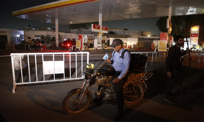 A busy fuel station during the Pakistan petrol price hike.