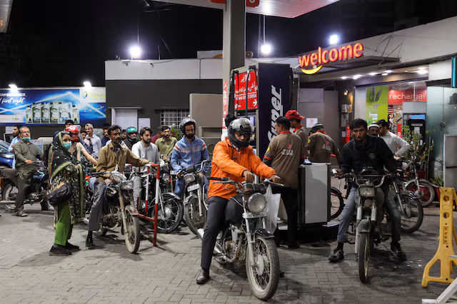 A busy fuel station during the Pakistan petrol price hike.
